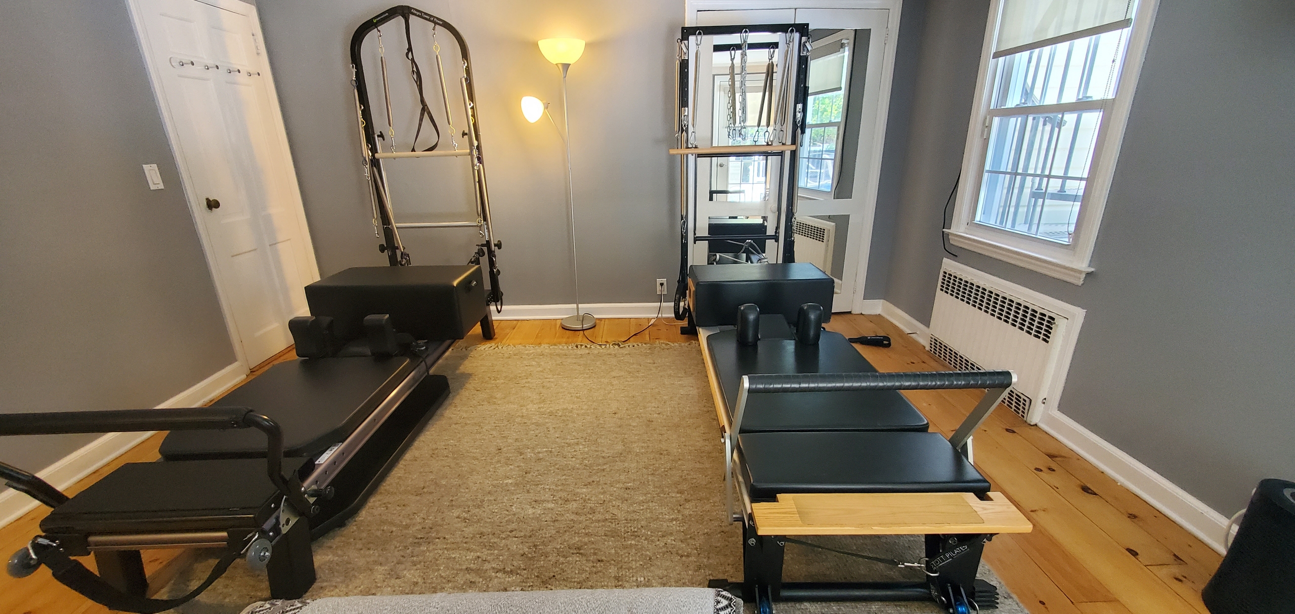 Gail's home Pilates studio with reformers and natural light